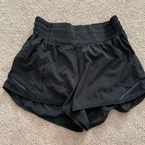 Lululemon black track that shorts 3”